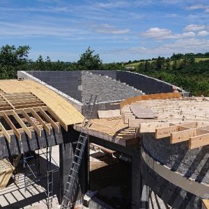 Close up view of the circular roof and curved roof before plywood installed